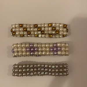 Three multicolored pearl bracelets